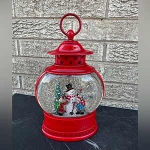 Red Lantern Snow Globe with Snowman Scene